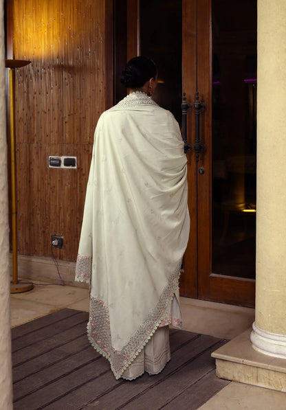 PEARLOSA wearing this beautiful dress FROM LUXURY WINTER '25.